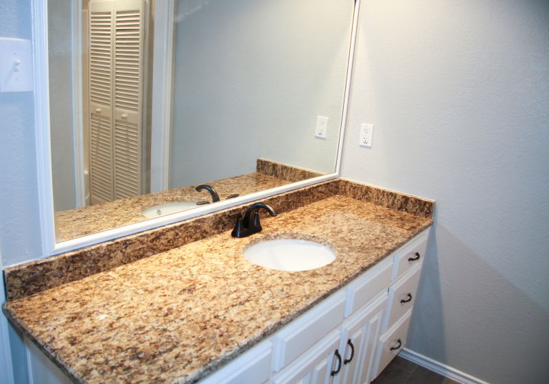 Elegant bathroom with granite vanity